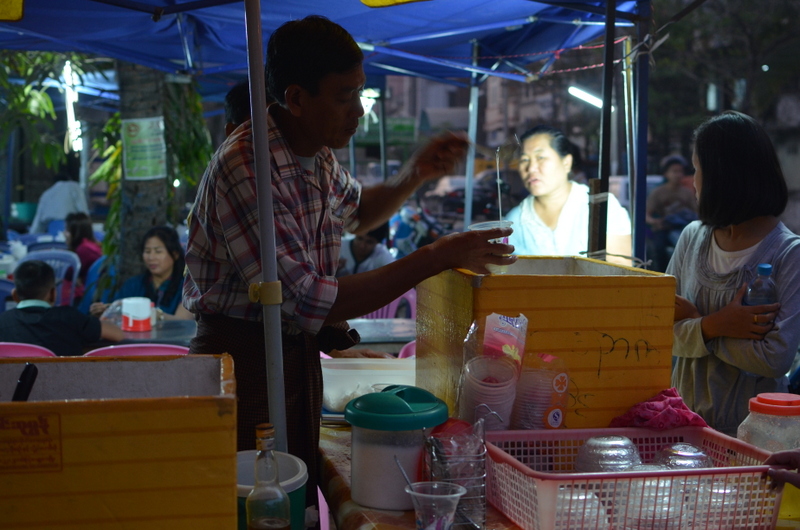 yogurt stand in outdoor market near Diamond Plaza, photo taken by Alex