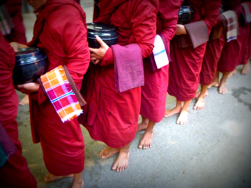 Monks awaiting their last meal of the day